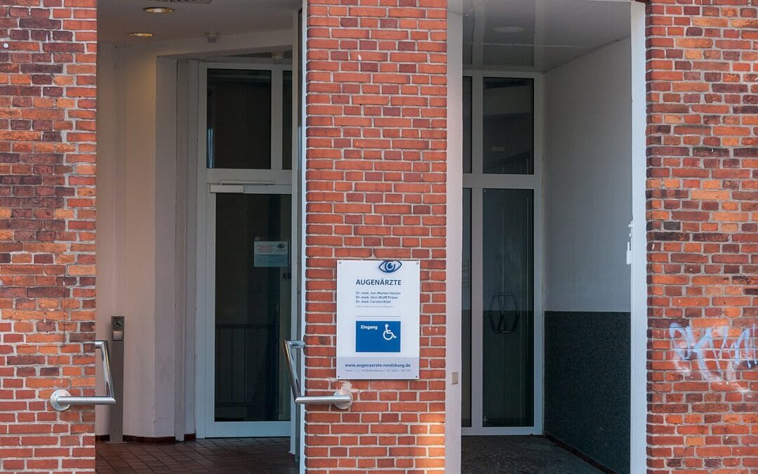 A home entrance with a retrofitted wheelchair ramp