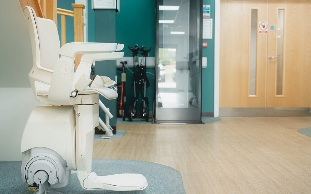 A modern chair stairlift fitted to a straight domestic staircase
