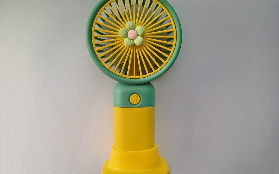 Portable battery-powered personal fan for hands-free cooling
