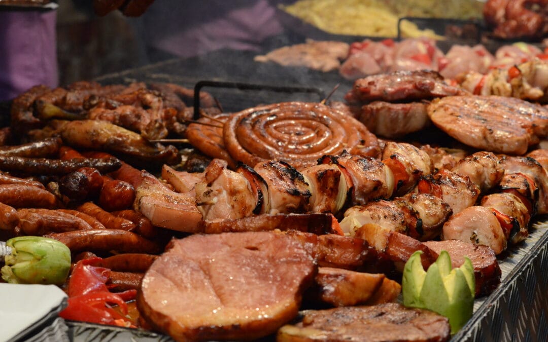 Sausages, kebabs and meat grilling on a barbecue