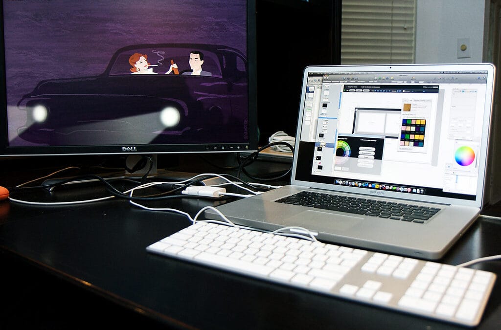 Laptop on a desk in a home-office setup, illustrating laptop stands