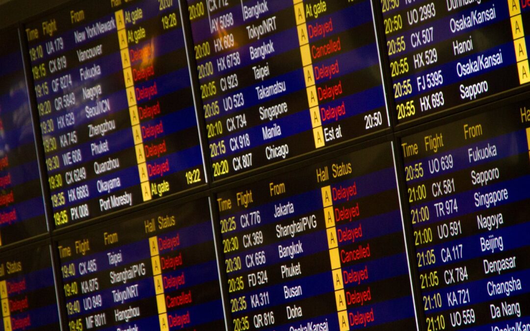 An airport flight departures information board